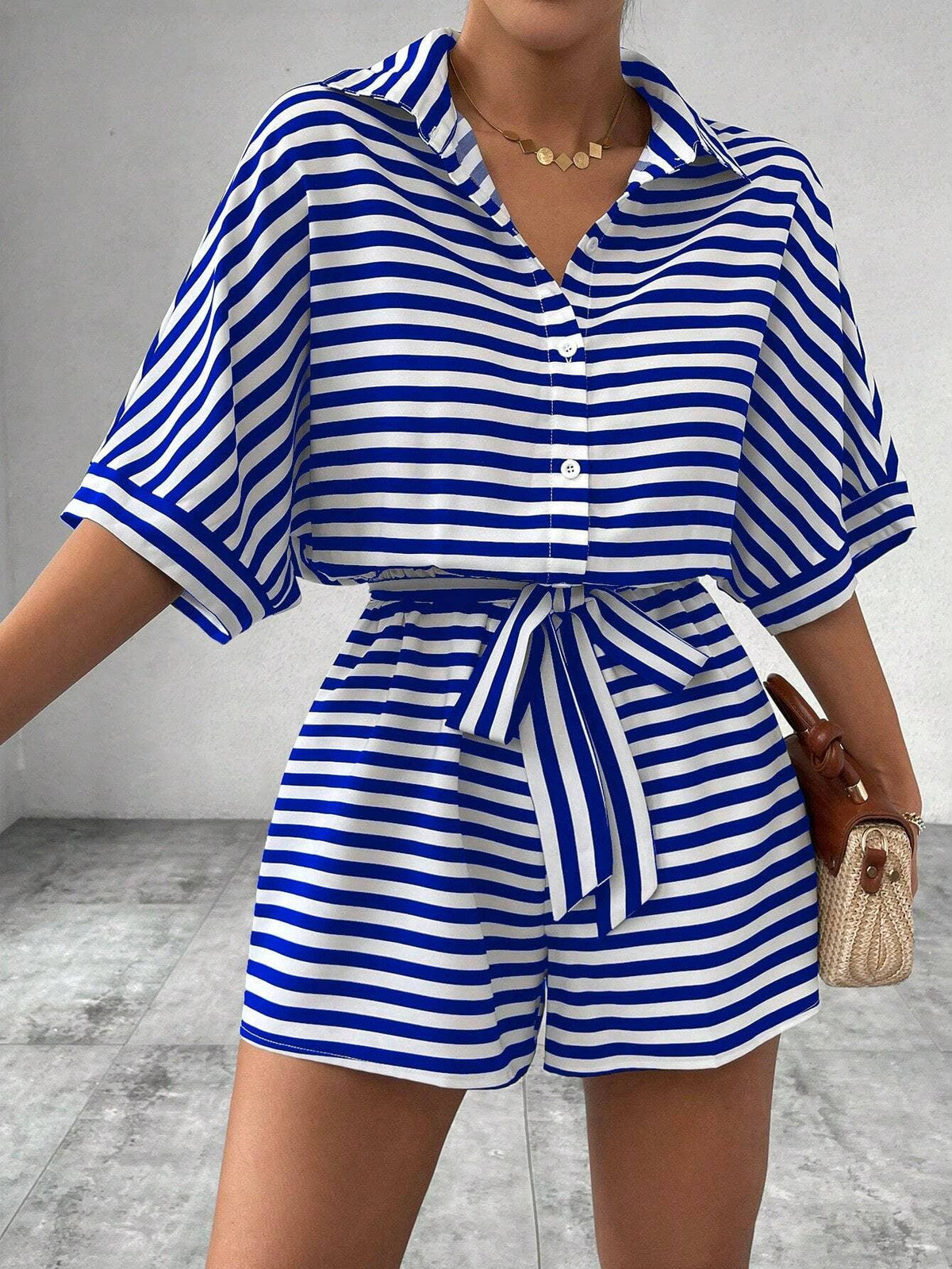 Women’s striped buttoned cardigan romper