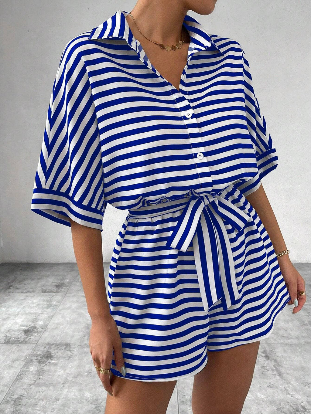 Women’s striped buttoned cardigan romper
