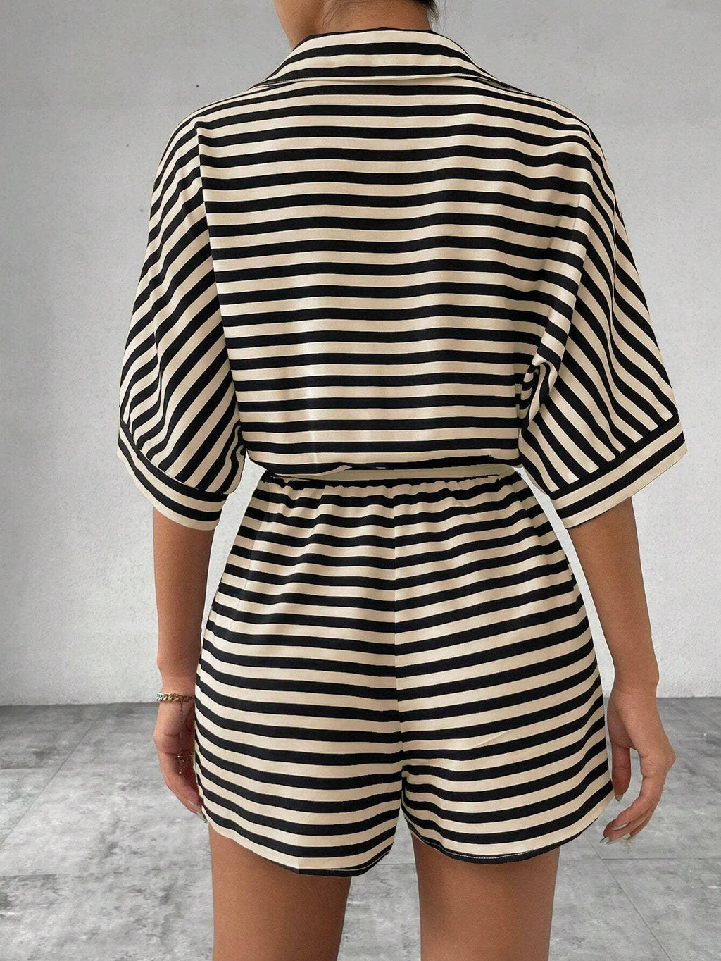Women’s striped buttoned cardigan romper
